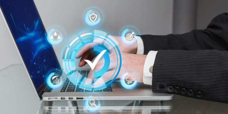 Businessman using a laptop with digital icons representing Microsoft Dynamics 365 business technology and automation